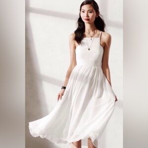 Banana Republic chiffon dress with leather bodice. Lined, back zipper. Size 4
